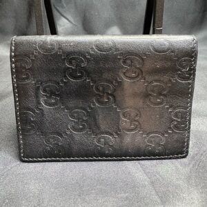 Gucci Black GG Embossed Leather Wallet